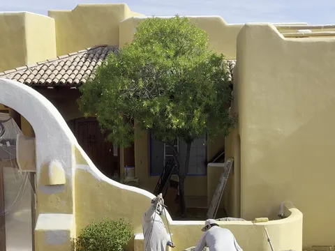 Before — Crew prepping and finished entry courtyard of Santa Fe style custom home in Fountain Hills AZ